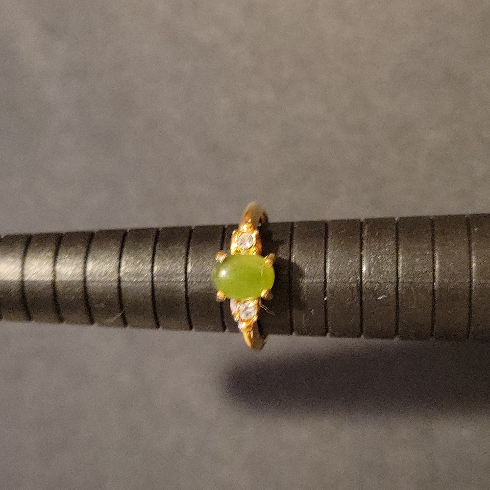 Vintage Avon ring goldtone  green and white  stones